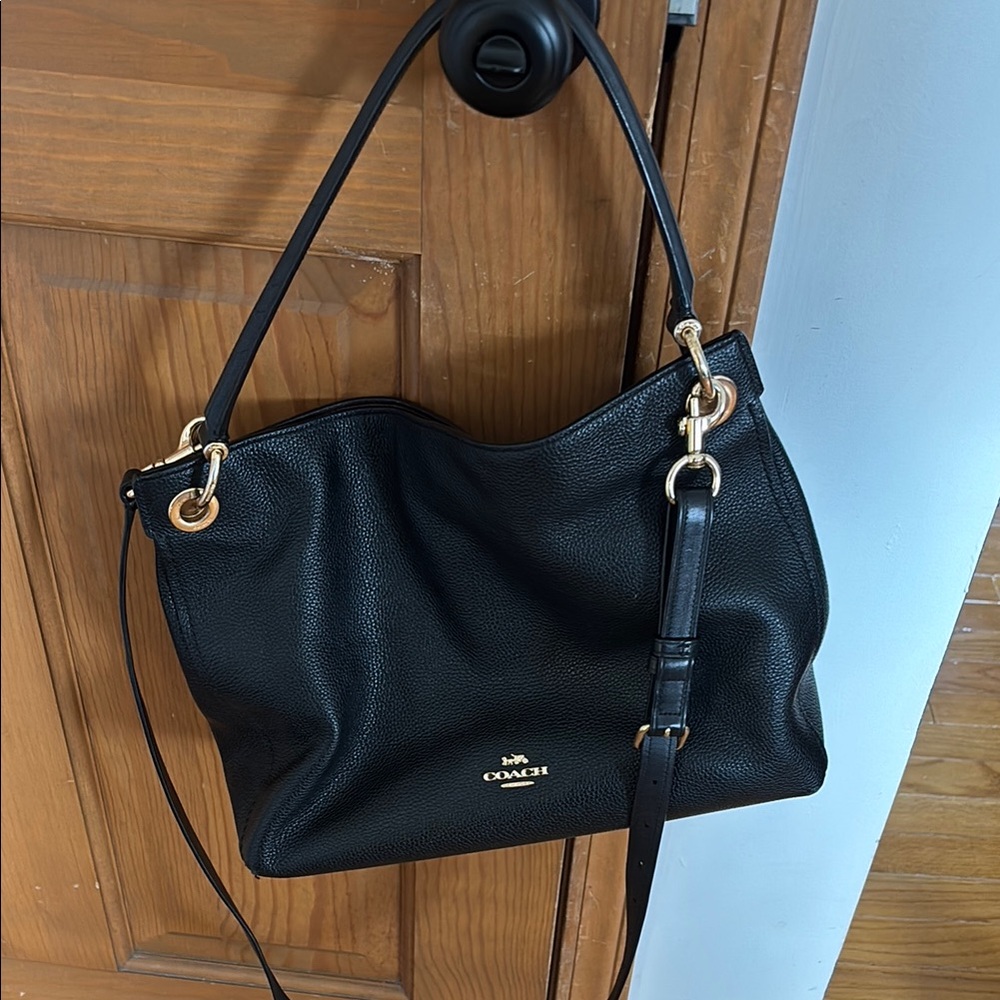 Coach Black Leather Shoulder Bag measurements are 14” wide and 10” long